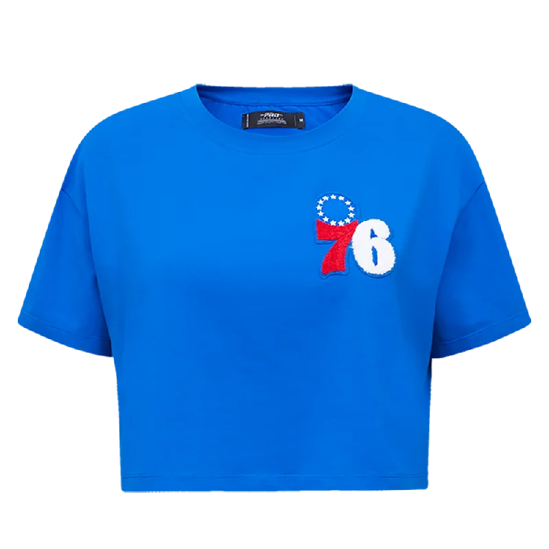 NBA PHILADELPHIA 76ERS CLASSIC WOMEN'S BOXY TEE (ROYAL BLUE) Elasticated Padded Insulated NBA PHILADELPHIA 76ERS CLASSIC WOMEN'S BOXY TEE (ROYAL BLUE) Elasticated Padded Insulated